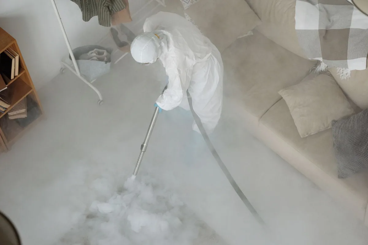 Biohazard cleanup technician in protective equipment, Greenwich, Detroit, MI